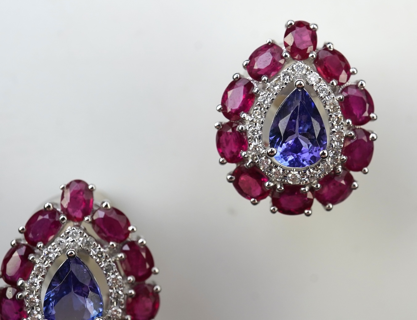 A pair of tanzanite, ruby and diamond earrings